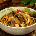 Acar Pedas Daging in a wok