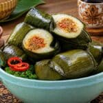 Freshly boiled Lontong Daging with savory beef filling