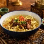 Bowl of authentic Mi Bebek duck noodle soup