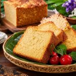Slice of fluffy Ontbijtkoek recipe cake with nuts